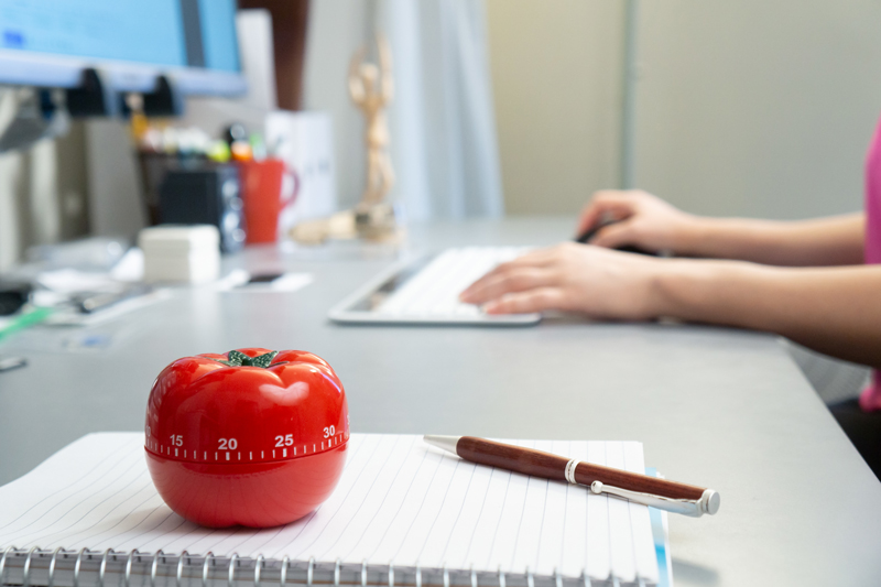 desk with pomodoro timer