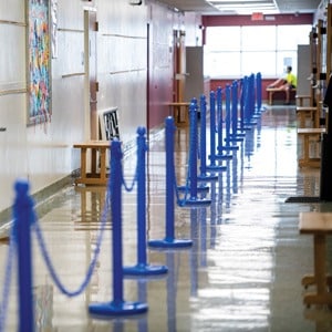 stanchions used to socially distance Groves students during COVID-19