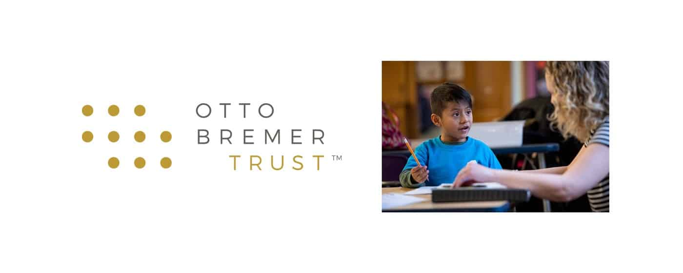 otto bremer logo teacher with student