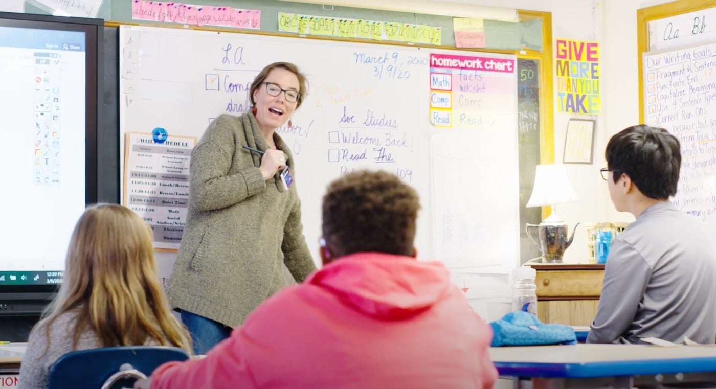 teacher talking to students